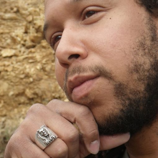 Mighty Mystic wearing the Trunity Rastaman Ring